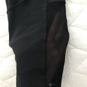Cropped Alo yoga black leggings. Mesh sides.